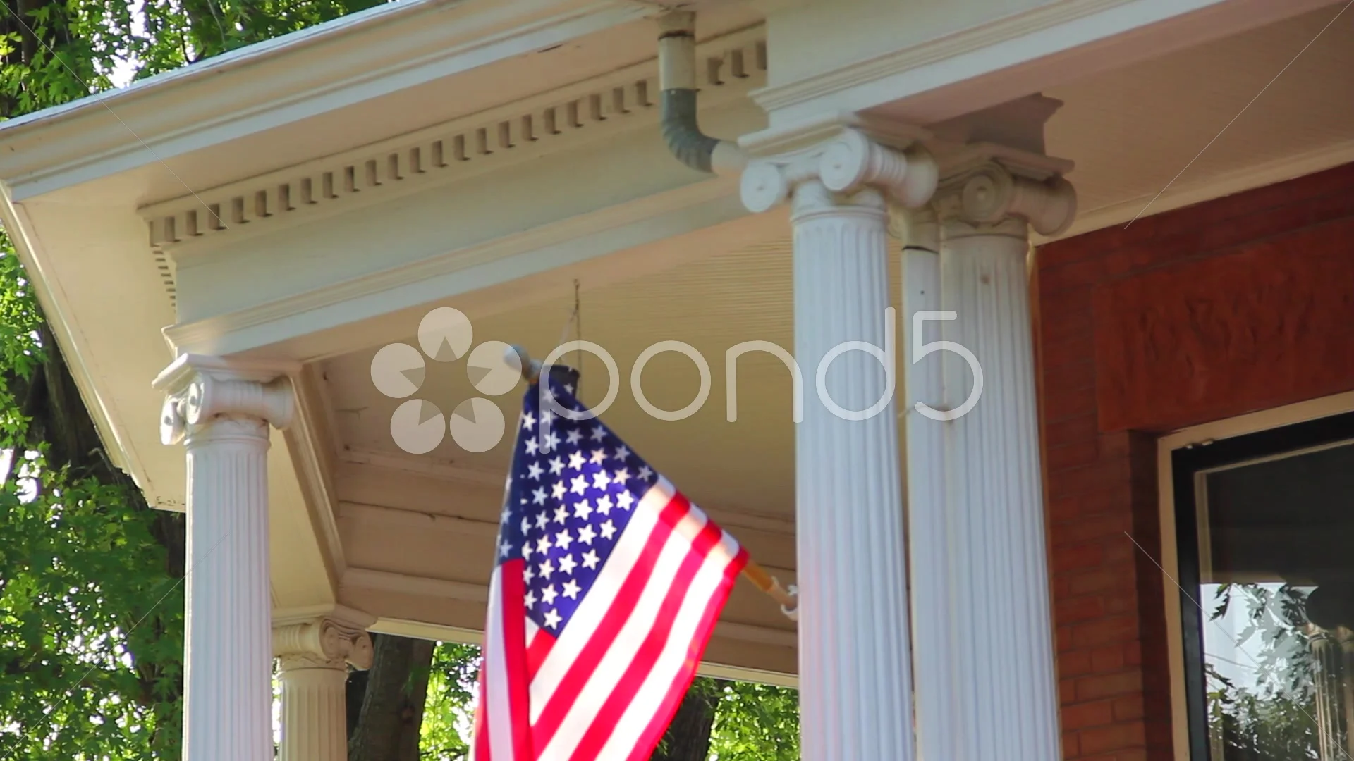 american flag on porch