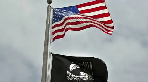American Flag with POW Flag Stock Footage 24756453
