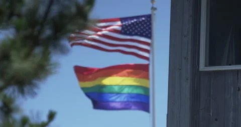 AMERICAN FLAG + PRIDE FLAG Stock Footage 140370974