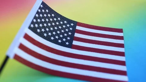 American flag on rainbow color background for Memorial Day or July 4th. Stock Footage 108677255