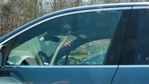 American Flag Reflection on Car Window Glass, Stock Footage 332518746