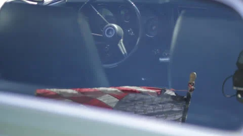 American Flag Reflection in Classic Car Window Stock Footage 25240566