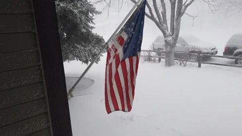 American Flag in the Snow Stock Footage 104579642