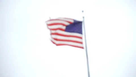 American flag super slow motion waves in wind on rainy day 스톡 동영상 106340281