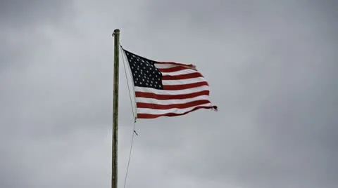 American Flag Tattered and Flapping in Storm slowmo Stock Footage 12058856