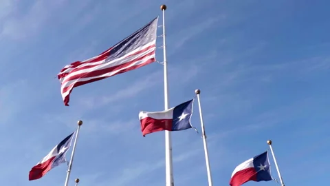 American Flag with Texas Flags During The Day Stock Footage 189161267