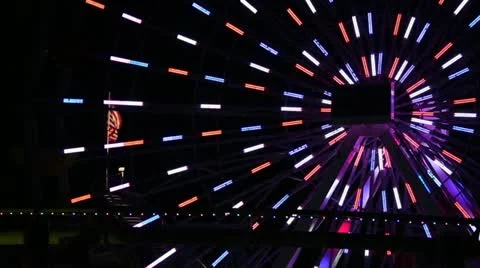 American Flag Through Spinning Ferris Wheel At Night HD Stock Footage 18586766