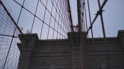 American Flag on Top of the Brooklyn Bridge Stock Footage 301648688