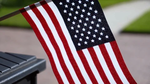American flag on top of a mailbox blowing in the wind Stock Footage 129386008