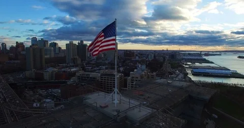 American Flag on top of the west tower of the Brooklyn Bridge Stock Footage 76051197