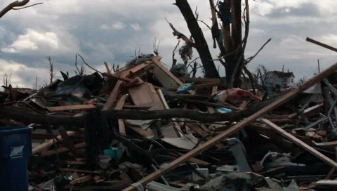 American Flag On Tree Amongst Tornado Wreckage (HD) c Stock Footage 5504802