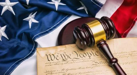 American flag with US constitution and a judge's gavel symbolizing the Americ Stock Photos