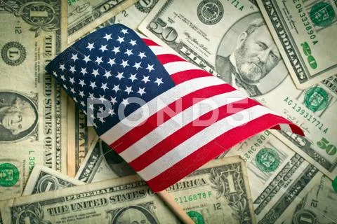 American flag with us dollars Stock Photos