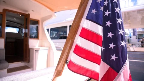 American flag waves on a boat. Stock Footage 89748317