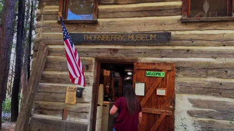 American Flag Waves Outside Historic Log Cabin Museum Near Yosemite Stock Footage 345511291