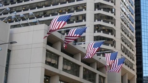American flag waves on the skyscrapers Stock Footage 78060874