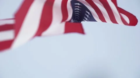American flag waving on sunset. Concept of Memorial Day, 4th of July Video stock 220430643