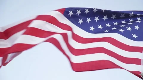 American flag waving on sunset. Concept of Memorial Day, 4th of July Stock Footage 220430760