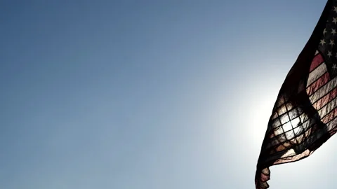 American flag waving on sunset or sunrise background, Slow Motion. Stock Footage 146125232