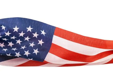 American flag waving in the wind isolated on white background with copy space. Photos