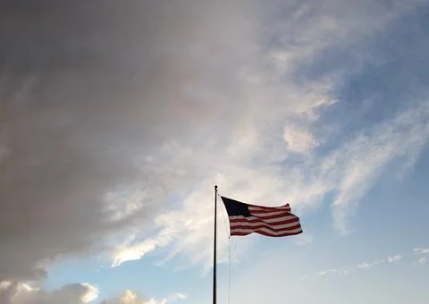American Flag Waving in The Wind Stock Photos