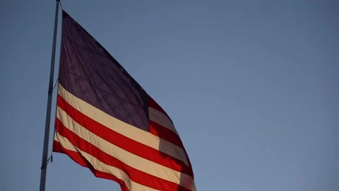 American flag waving in the wind slow motion Stock Footage 156582278