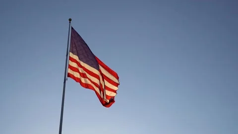American flag waving in the wind; slow motion Stock Footage 156582506