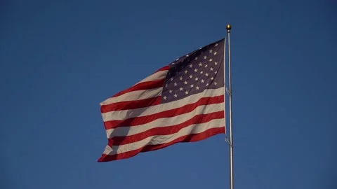 American flag waving in the wind; slow motion Stock Footage 156582872