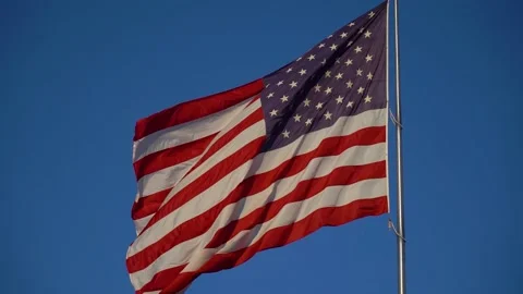 American flag waving in the wind; slow motion Stock Footage 156583310