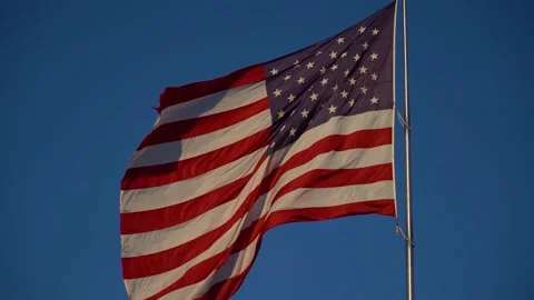 American flag waving in the wind; slow motion Stock Footage 156583590