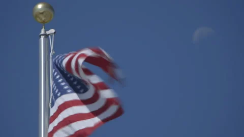 American flag in the wind with moon in the background Vídeos de archivo 145764219