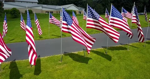 American Flags blowing in wind in 4k Stock Footage 91278736