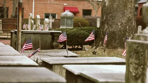 American flags develop over headstones Stock Footage 303124387