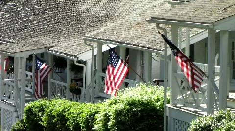 American flags fly softly in the breeze (HD) k Stock Footage 831657
