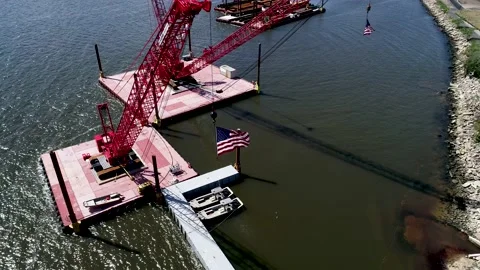 American Flags flying from cranes Vídeo Stock 139151592
