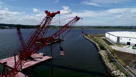 American Flags flying from cranes Stock-Footage 139151691