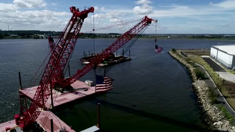 American Flags flying from cranes Stock Footage 139151820