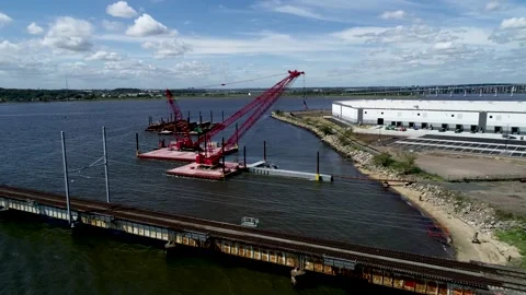 American Flags flying from cranes 스톡 동영상 139151995