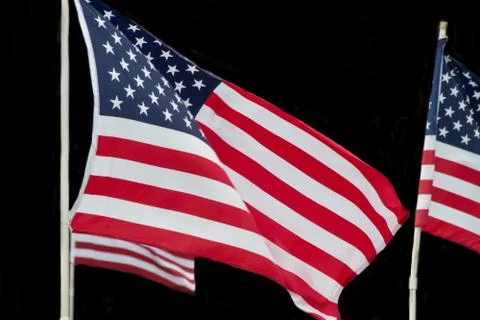 American flags flying in the wind Stock Photos