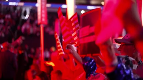 American flags wave under red stage lighting, RNC Dallas 2026 Stock Footage 345274207