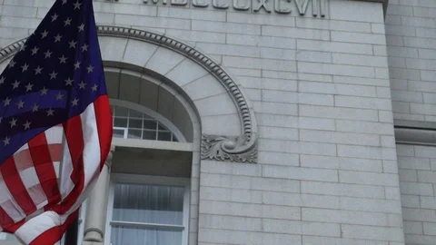 American Flags Waves in Front of Trump Hotel in DC Stock Footage 77189596