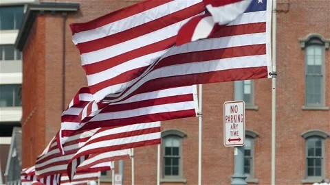 American flags waving in slow motion Stock Footage