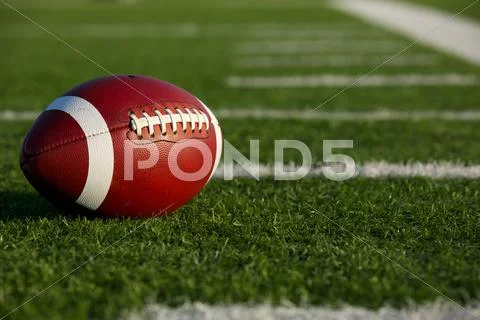 American football amongst the yard lines Stock Photos