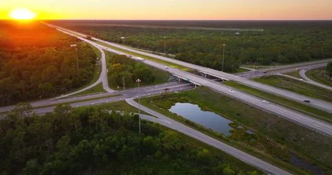 American highway bridge and exit lanes forming rural interchange Stock Footage 344887133