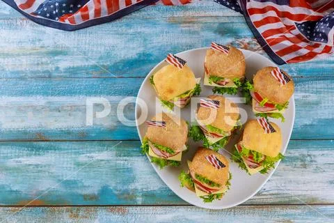 American holiday appetizer on blue background with flag. Stock Photos