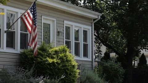 American house with flag Stock Footage 126299390