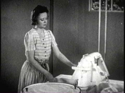 An American housewife is questioned about her laundry detergent in 1938, while Stock Footage