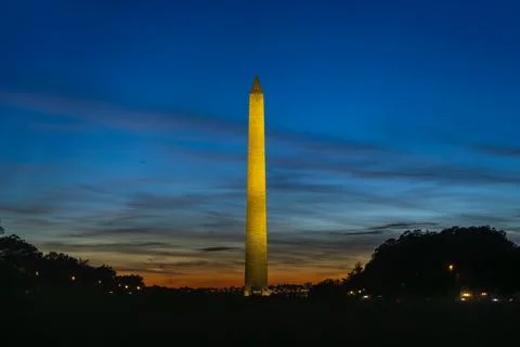 American landmark under dramatic sky. Washington Monument on National Mall Stock Photos
