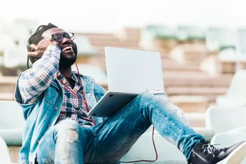 American man using laptop. Stock Photos
