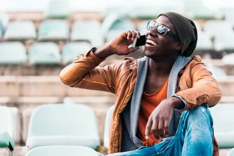 American man using mobile. Stock Photos